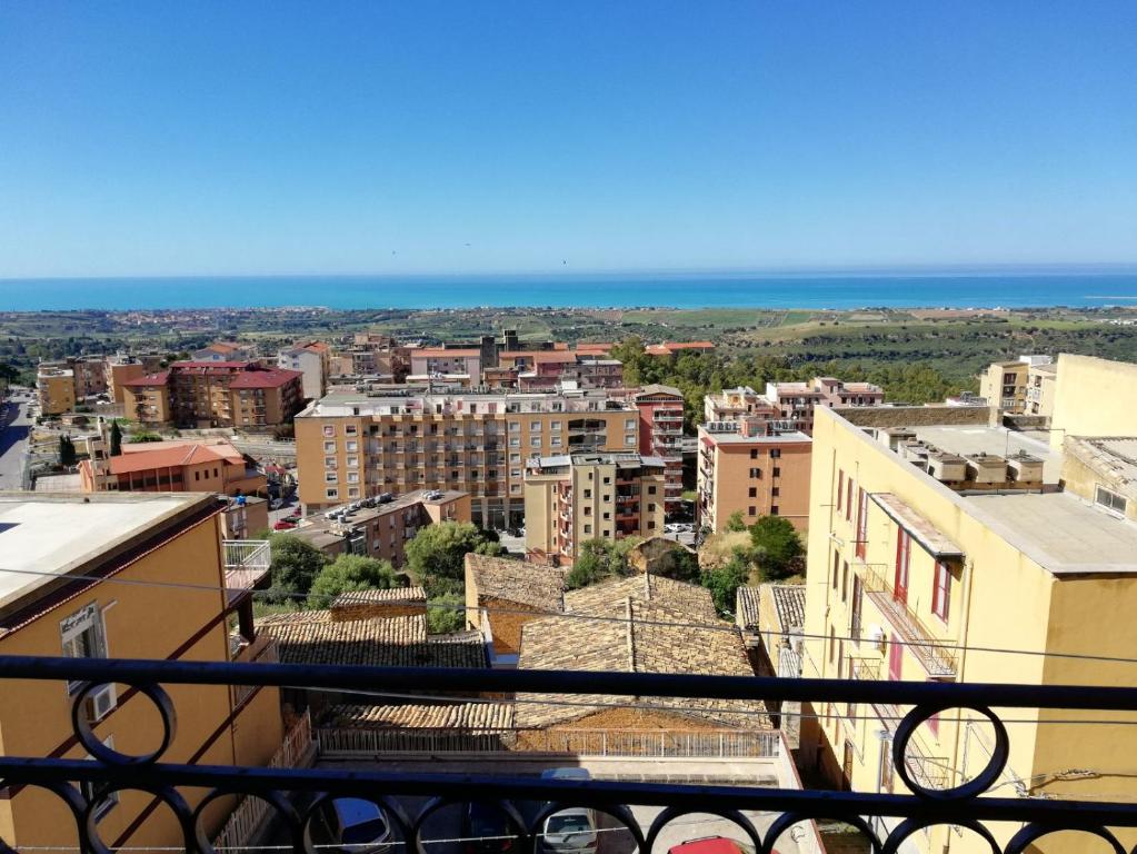 a view of a city from a balcony at Backpackers in Agrigento