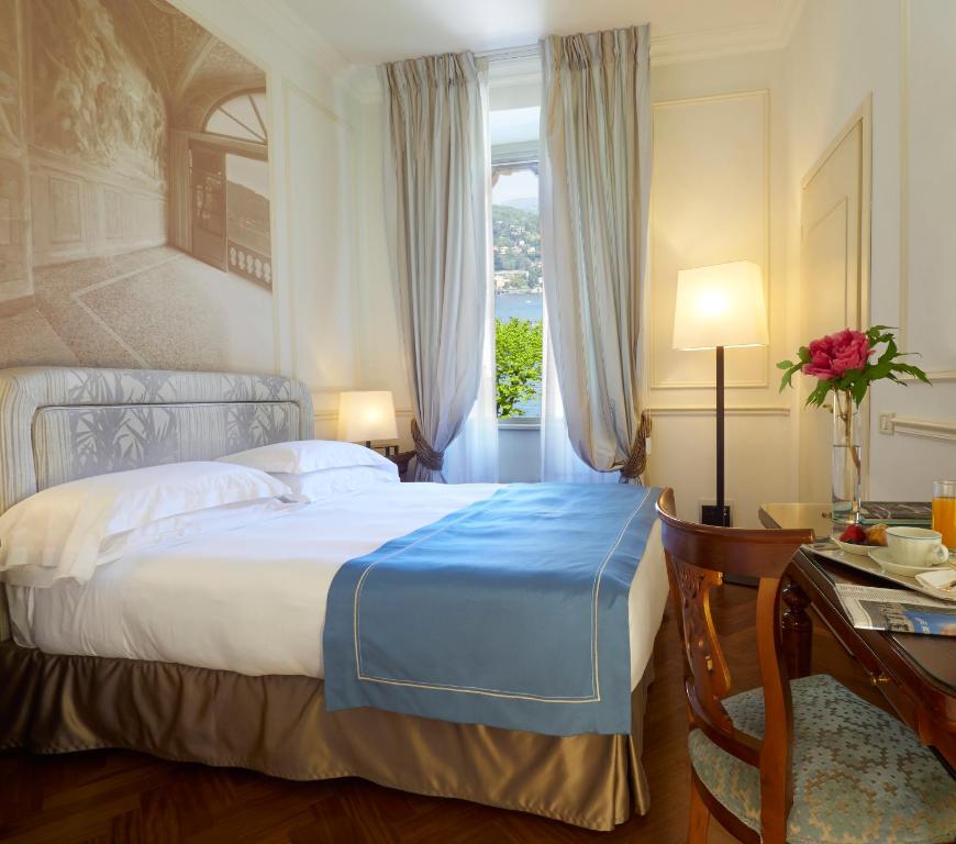 Una cama o camas en una habitación de Albergo Terminus