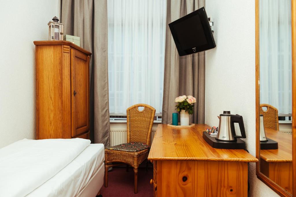 Postel nebo postele na pokoji v ubytování Hotel Corel