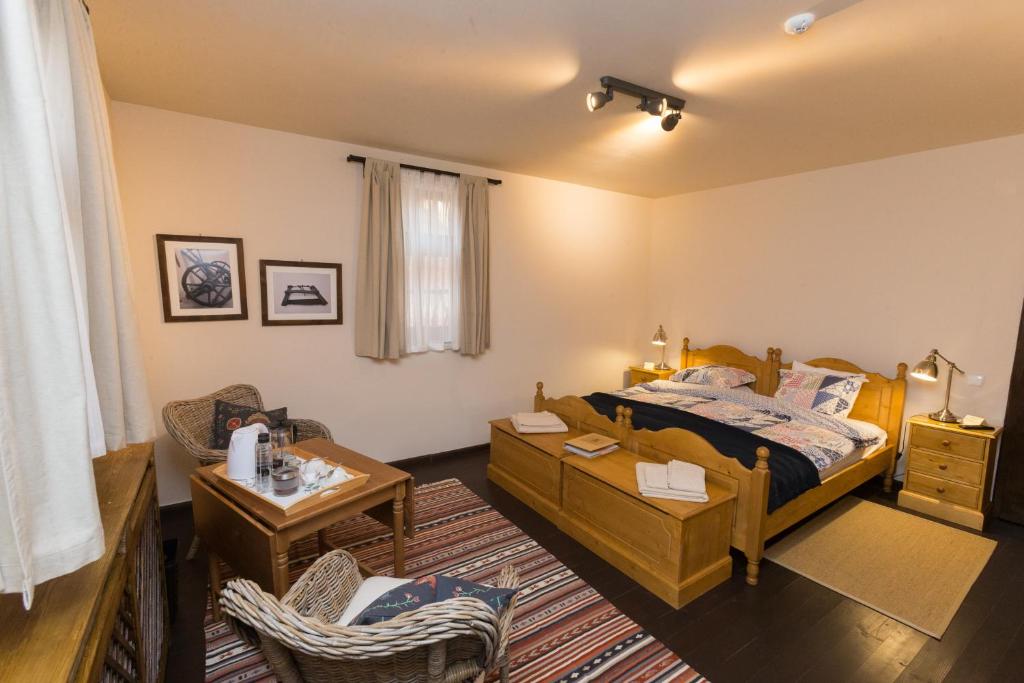 Ένα ή περισσότερα κρεβάτια σε δωμάτιο στο Ratiu House