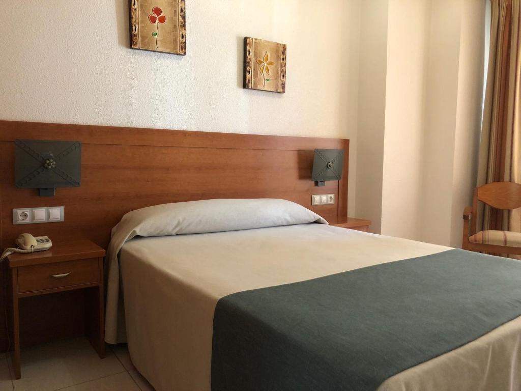 Postel nebo postele na pokoji v ubytování El Paso