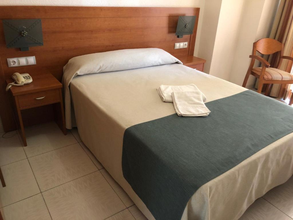 Postel nebo postele na pokoji v ubytování El Paso