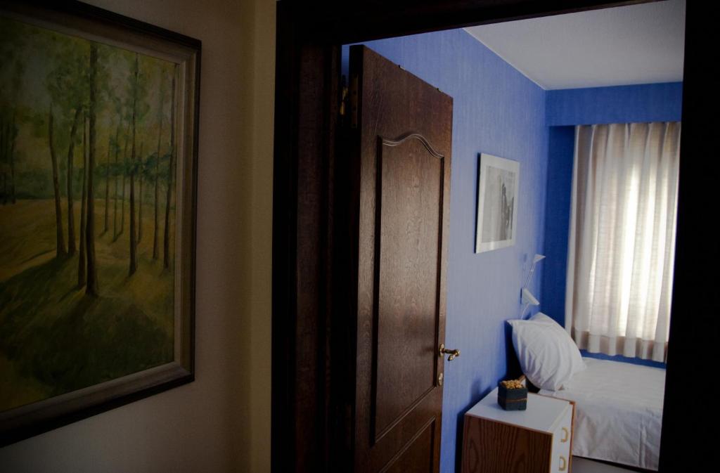 Postel nebo postele na pokoji v ubytování B&B Goudsbloempje