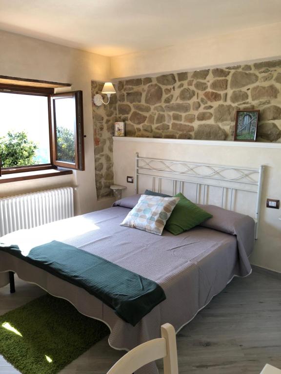 Postel nebo postele na pokoji v ubytování Iris Country House
