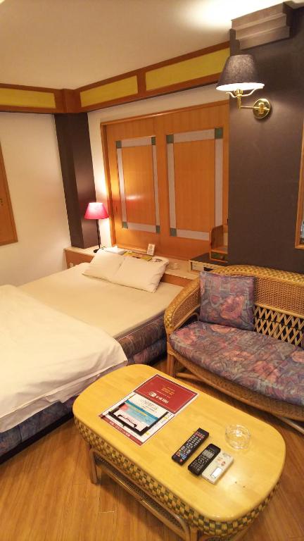 Postel nebo postele na pokoji v ubytování Hotel Essor (Adult Only)