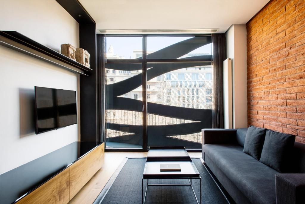TV a/nebo společenská místnost v ubytování Suites Avenue