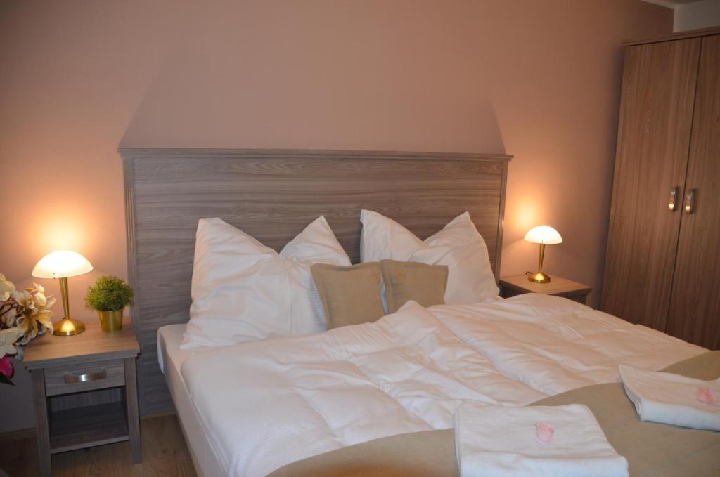 Postel nebo postele na pokoji v ubytování Resort Erich
