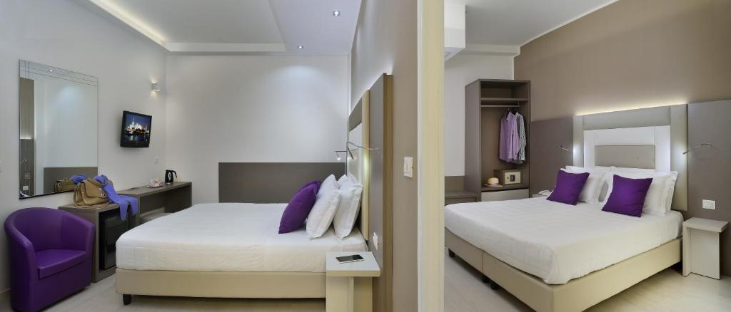 Postel nebo postele na pokoji v ubytování Hotel Boemia