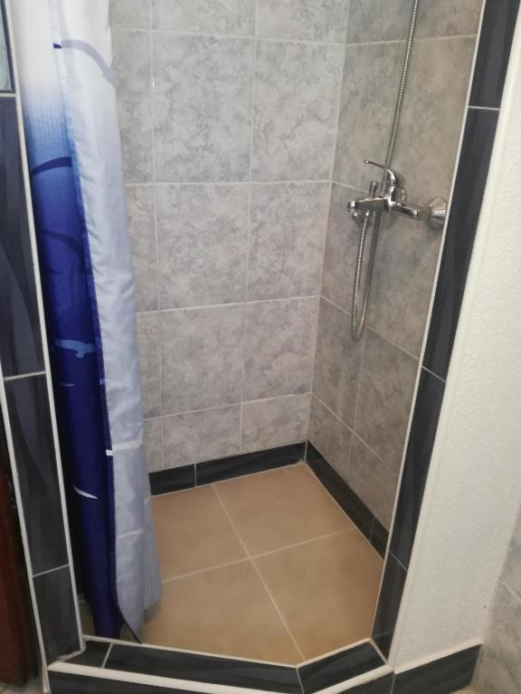 Łazienka w obiekcie Rooms & Apartment Hegic
