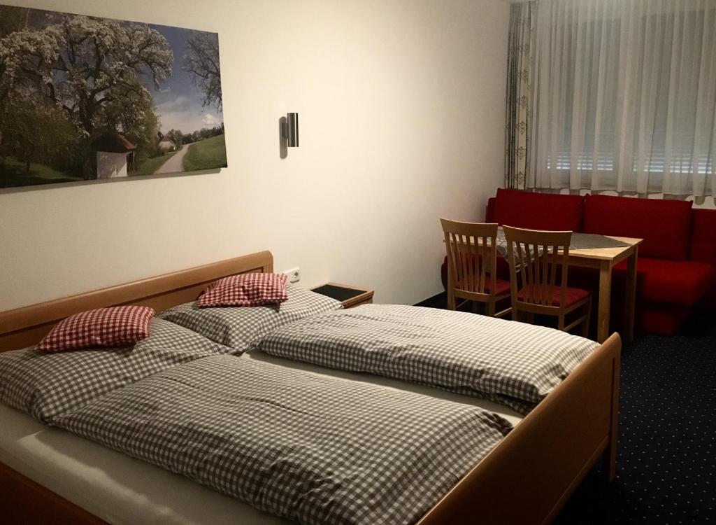 Postel nebo postele na pokoji v ubytování Hotel - Landgasthof Winklehner