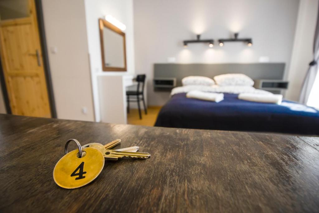Posteľ alebo postele v izbe v ubytovaní Pokoje Gościnne Św. Anny