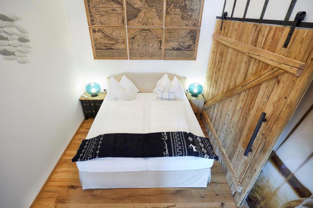 Postel nebo postele na pokoji v ubytování Boutique Appartments AlteGreißlerei