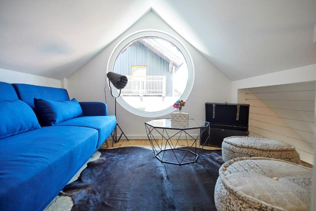 TV a/nebo společenská místnost v ubytování Boutique Appartments AlteGreißlerei