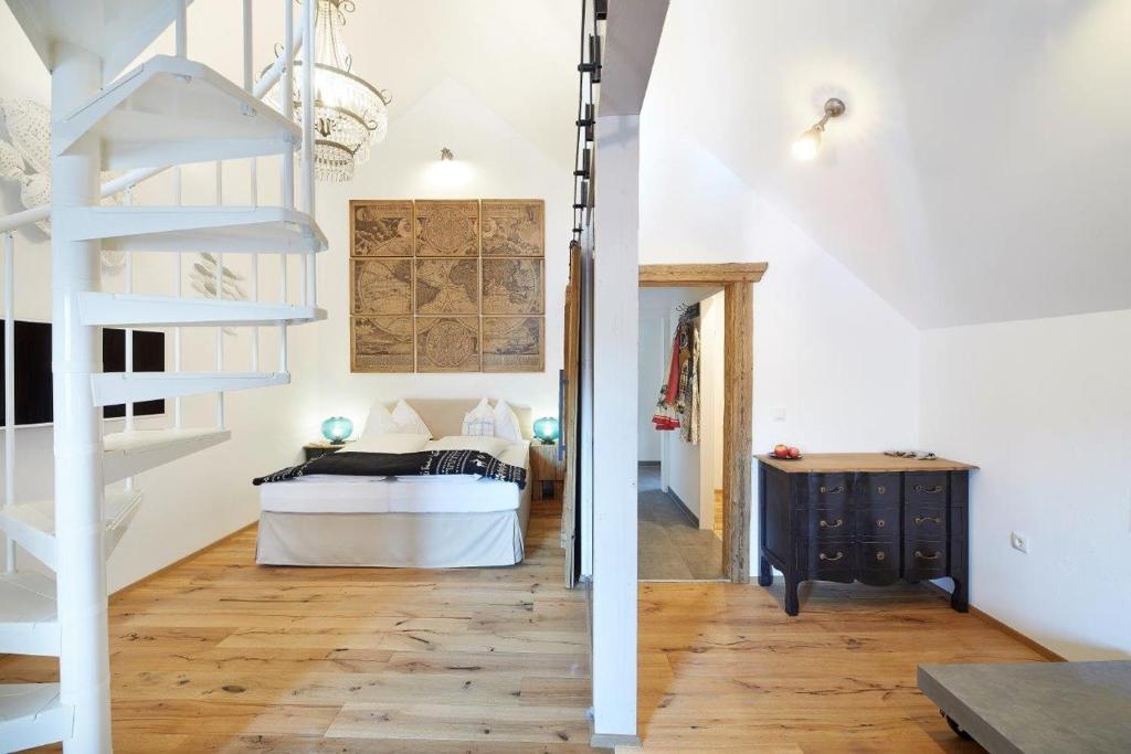 Postel nebo postele na pokoji v ubytování Boutique Appartments AlteGreißlerei