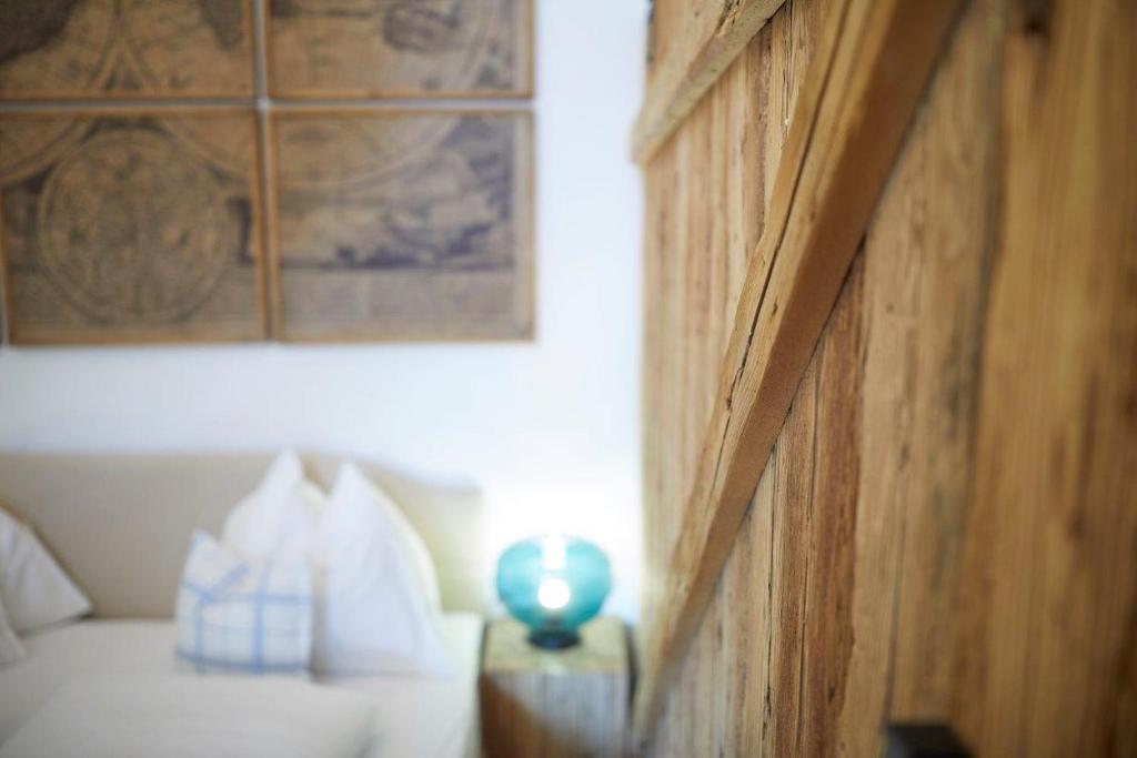Postel nebo postele na pokoji v ubytování Boutique Appartments AlteGreißlerei