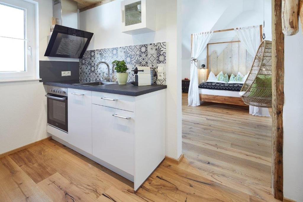 Kuchyň nebo kuchyňský kout v ubytování Boutique Appartments AlteGreißlerei