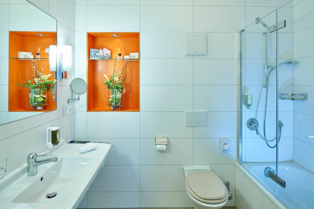 Koupelna v ubytování Hotel Ambassador