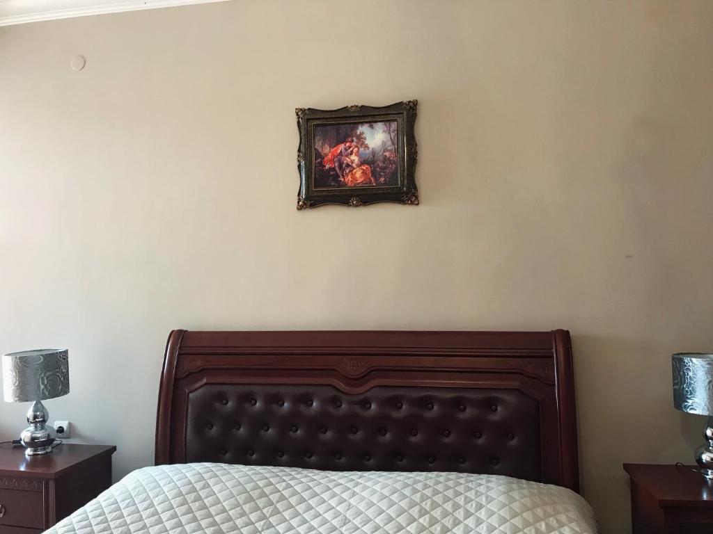 Postel nebo postele na pokoji v ubytování Guest House kartvelishvili