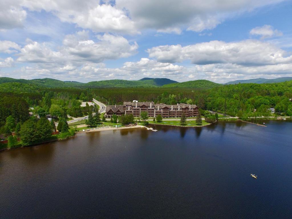 an aerial view of a resort on a lake at Le Grand Lodge Mont Tremblant in Mont-Tremblant