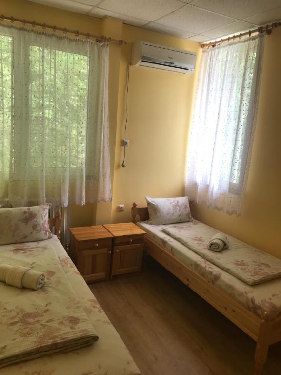 Postel nebo postele na pokoji v ubytování Family Hotel - Relax