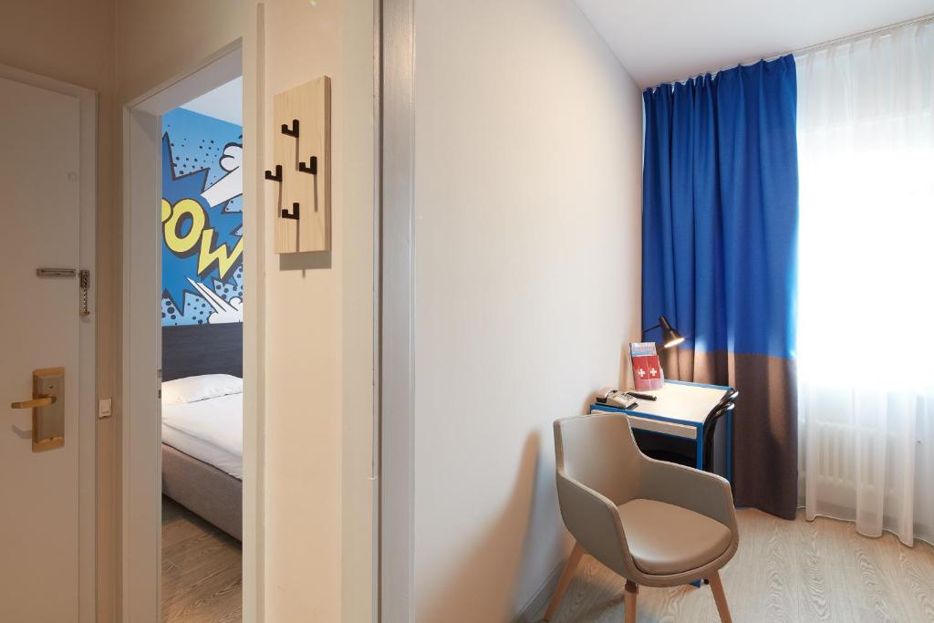 Postel nebo postele na pokoji v ubytování Hôtel Crystal