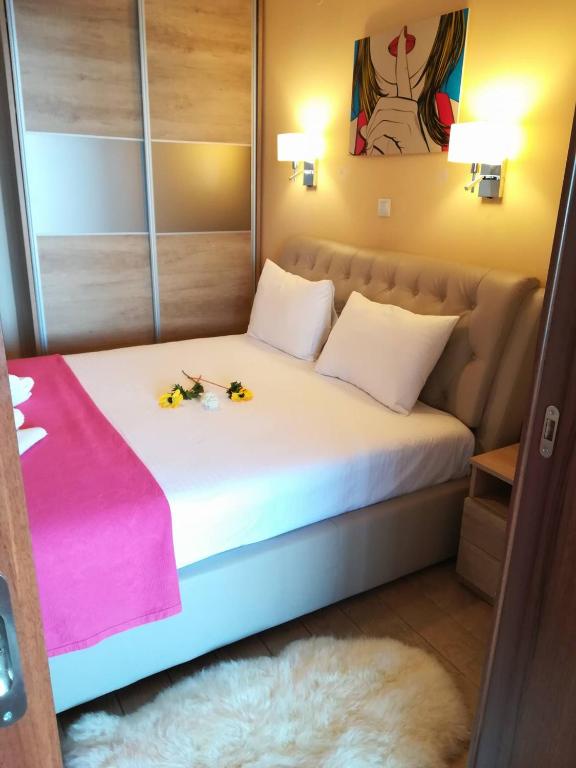 Postel nebo postele na pokoji v ubytování Olympic Hotel