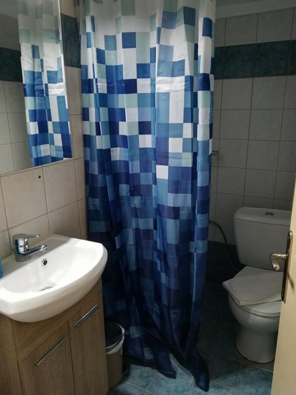 Koupelna v ubytování Olympic Hotel