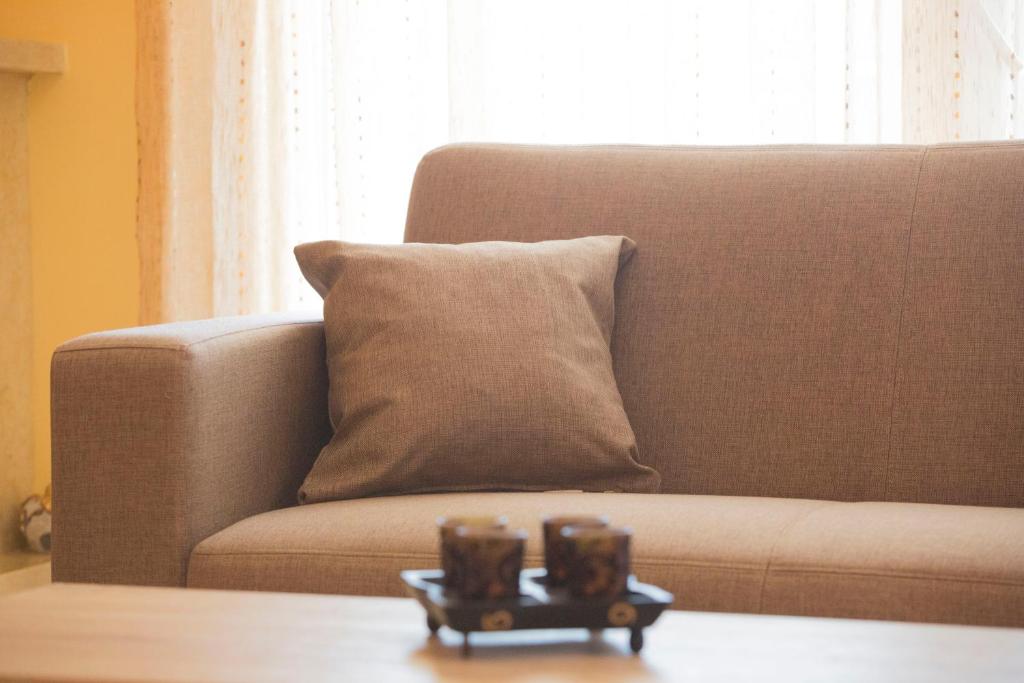 Posezení v ubytování Eri Apartment