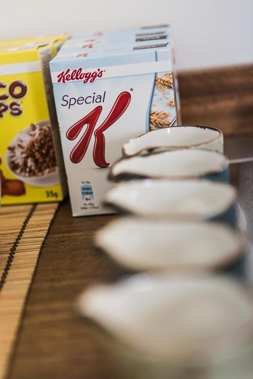 a pack of krispy kreme cookies next to a box of cereal at Murella Living in Marsalforn