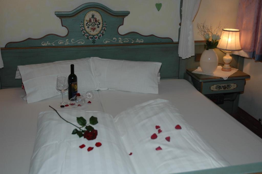 Postel nebo postele na pokoji v ubytování Hotel Gasthaus Schwarzenstein