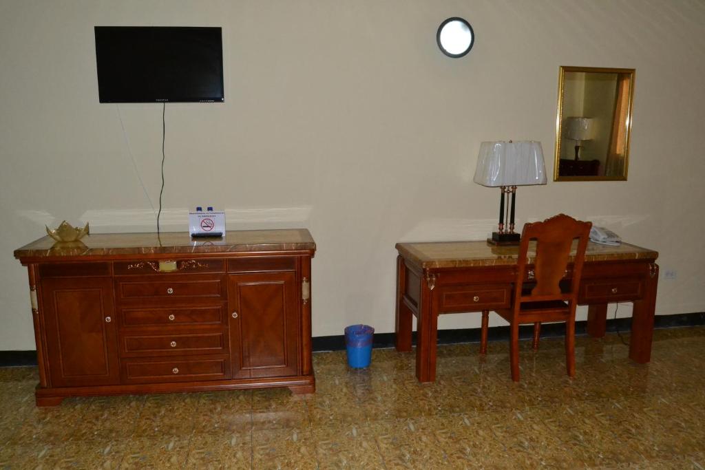 TV a/nebo společenská místnost v ubytování Metro Hotel Couva