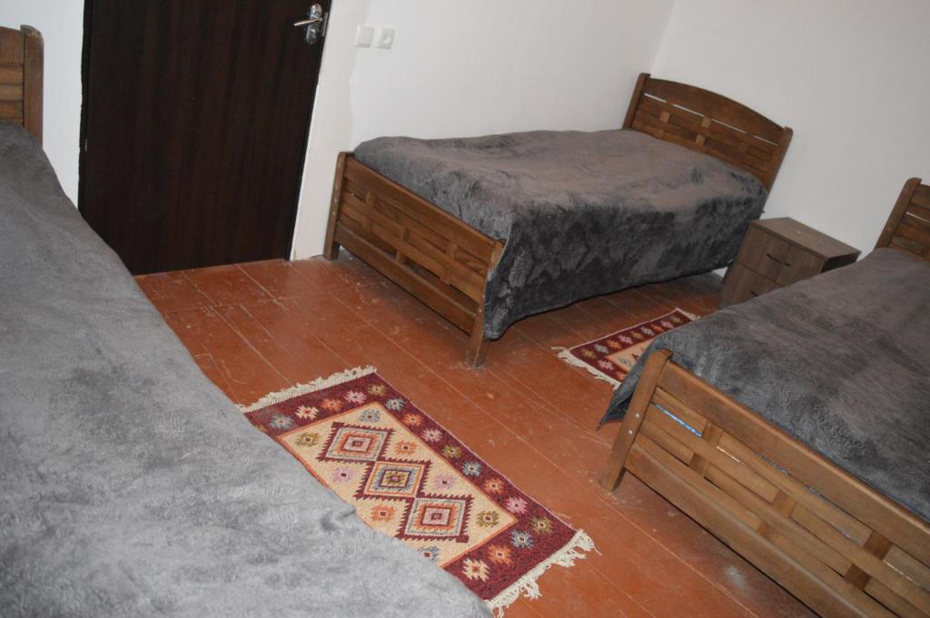 Postel nebo postele na pokoji v ubytování Vichnashi
