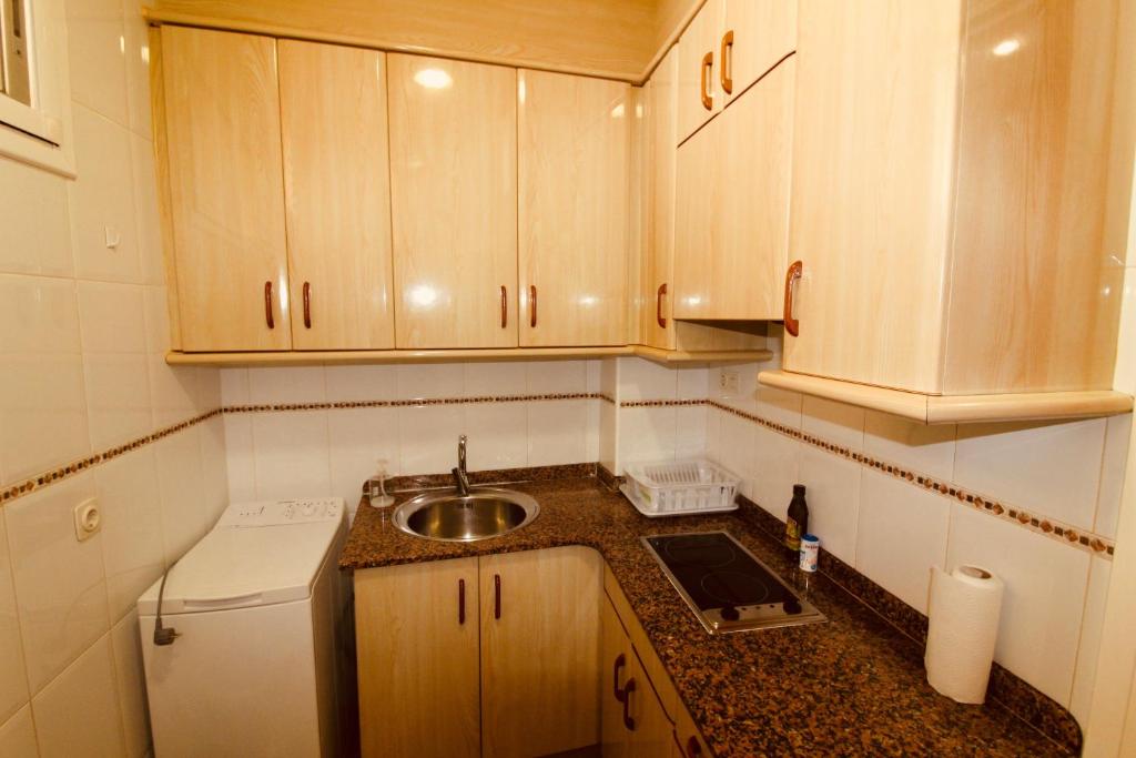 Kuchyňa alebo kuchynka v ubytovaní Apt ideal para familias cerca del mar