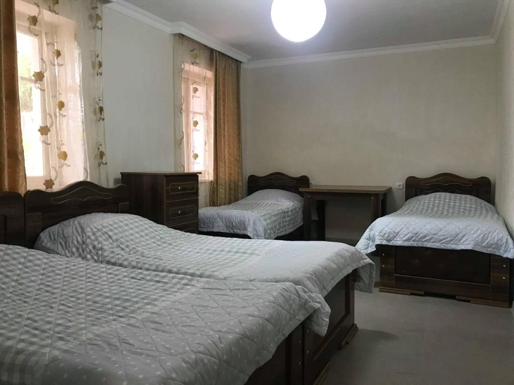 Postel nebo postele na pokoji v ubytování Guest house Racha