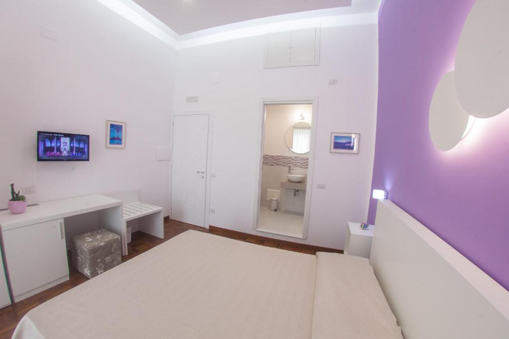 Letto o letti in una camera di 319 al Duomo