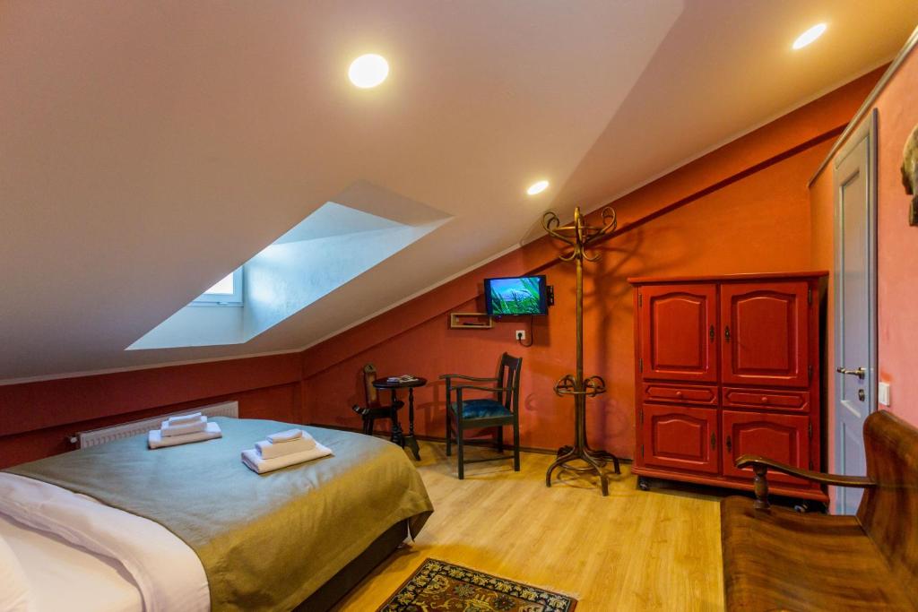 Postel nebo postele na pokoji v ubytování Kindli Boutique Hotel