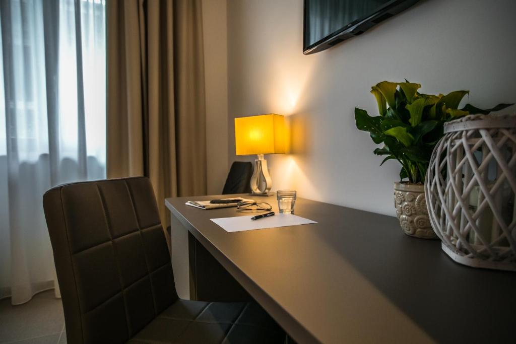 TV a/nebo společenská místnost v ubytování Moma Hotel Wellness & Spa