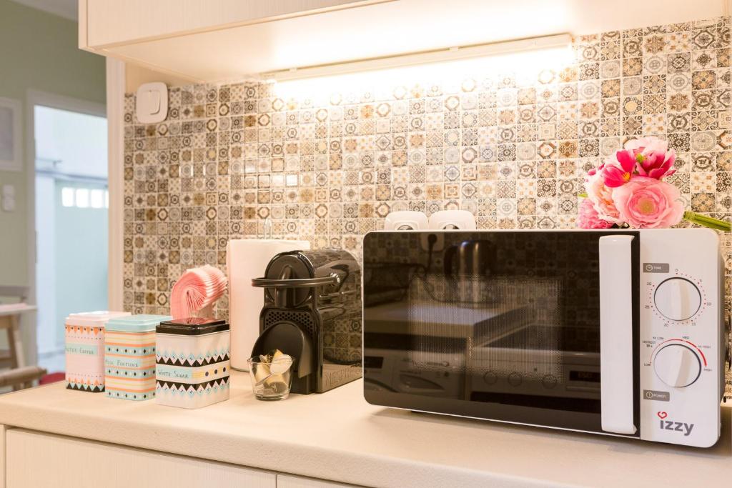 Kuchnia lub aneks kuchenny w obiekcie Grandma's Chic & Bright Athenian home with a Patio
