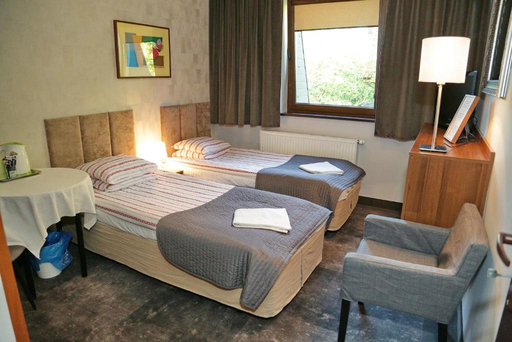Posteľ alebo postele v izbe v ubytovaní B & B Tomula