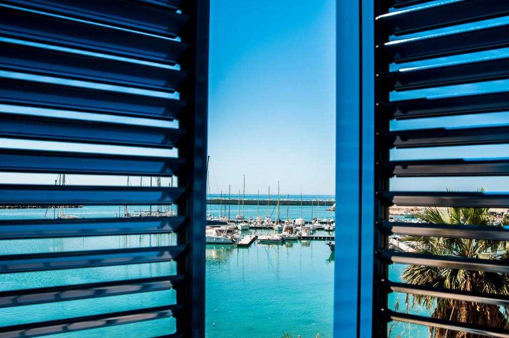 a view from a window of a marina at POSTU D'INCANTU in Sciacca