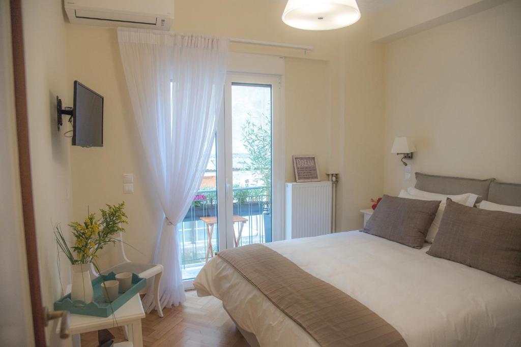 Living near Acropolis by Sylvia Staikou 2nd & 3d floor - 3