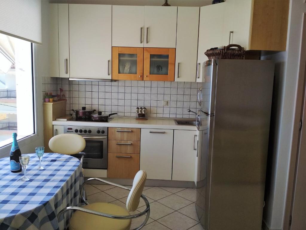 Kuchyň nebo kuchyňský kout v ubytování Luxury Sea View
