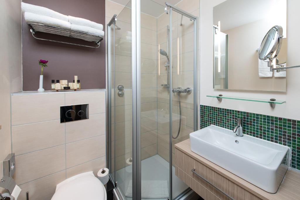Koupelna v ubytování Hotel New Orly