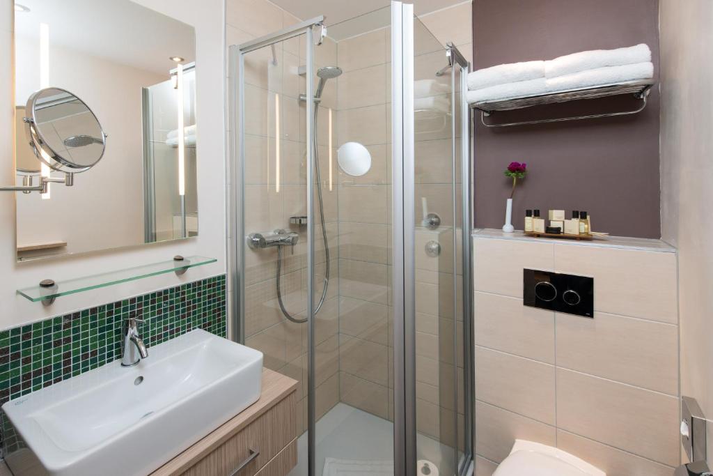 Koupelna v ubytování Hotel New Orly