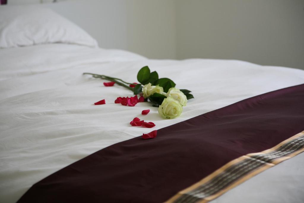 Postel nebo postele na pokoji v ubytování B&B Kanegem Onverbloemd