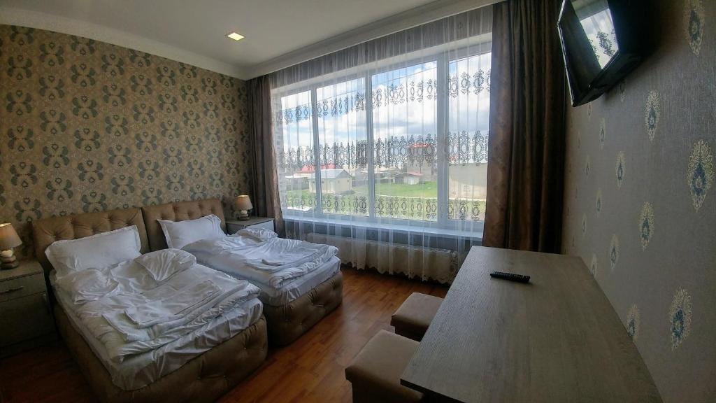 Letto o letti in una camera di Sonya