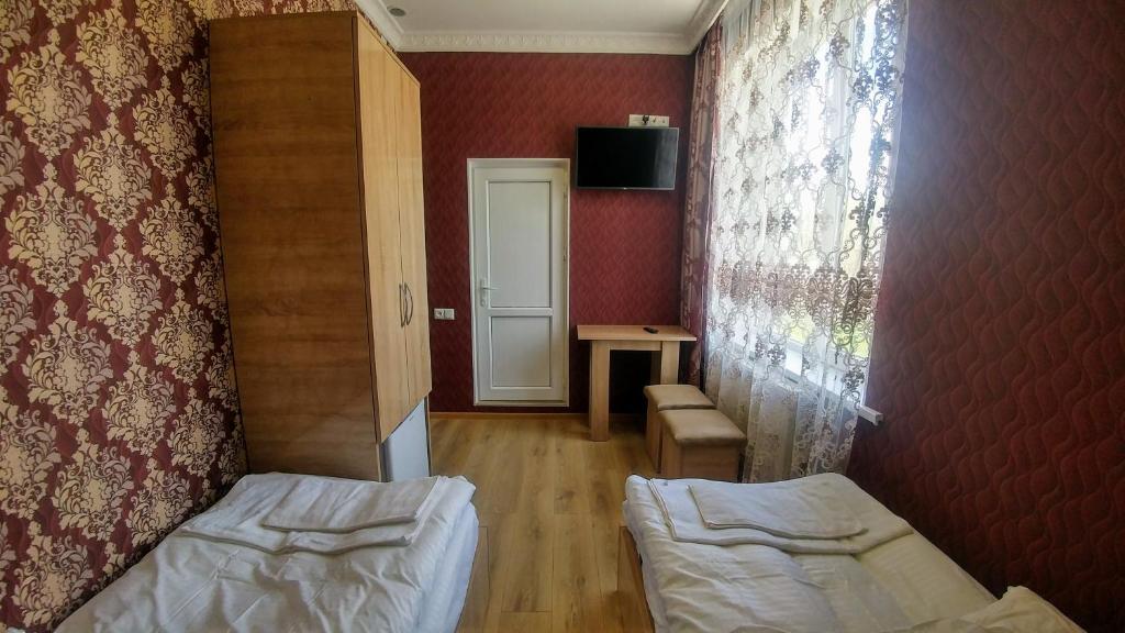 Letto o letti in una camera di Sonya