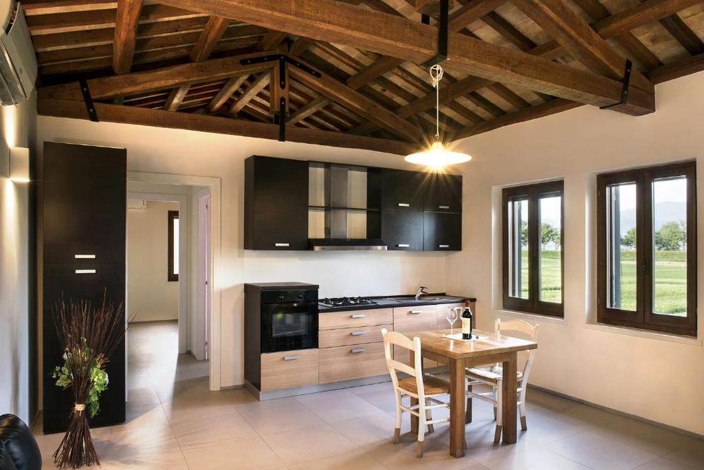 Kuchyň nebo kuchyňský kout v ubytování Hotel Villaggio Le Stelline