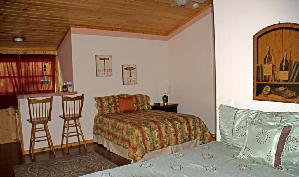 Postel nebo postele na pokoji v ubytování DiamondStone Guest Lodges