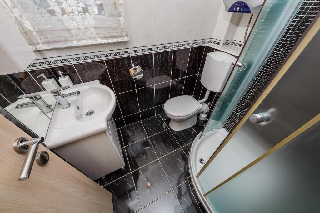 Kúpeľňa v ubytovaní Apartments Selak